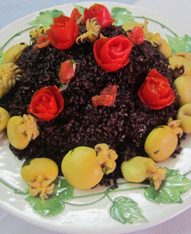 foto ricetta Cupola di riso nero con seppioline allo zafferano 