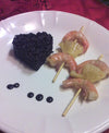 foto ricetta Cuore di riso nero con spiedini di gamberi e ananas aromatizzati all'aceto 