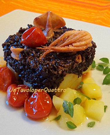 foto ricetta Riso nero con totani, patate e pomodorini 