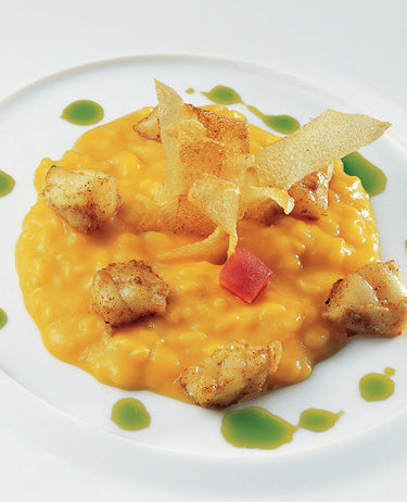 foto ricetta Risotto mantecato alla crema di carote con pesci speziati e olio di prezzemolo 
