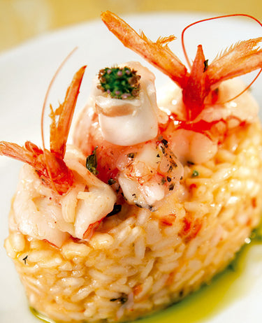 foto ricetta Risotto con gamberoni mantecato al lardo di Colonnata e timo al limone 