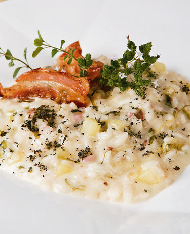 foto ricetta Risotto alle patate, scarola, crescenza e pancetta tostata 