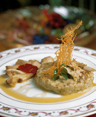 RICE CREAMED WITH OLIVE OIL SERVED WITH TURBOT FINS AND A SALAD OF YOUNG LEAVES 