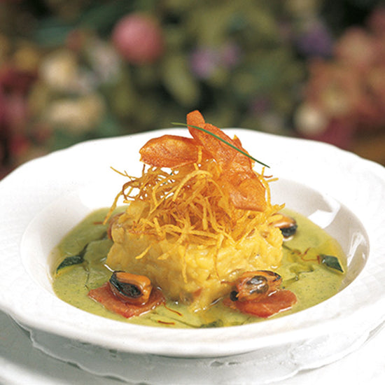 RISOTTO CON COL RIZADA, BEICON Y PIMIENTA NEGRA 